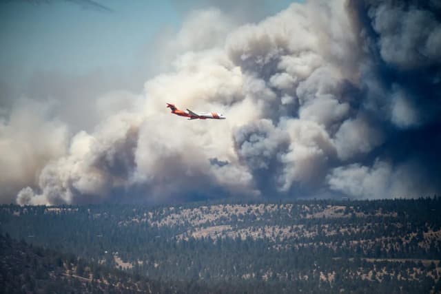 Macron calls crisis meeting as monster wildfires drive 250,000 from their homes