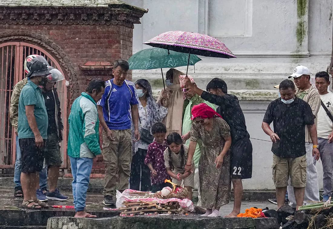 Families perform symbolic funeral for thousands still missing in Nepal, as death toll surges to 1,252